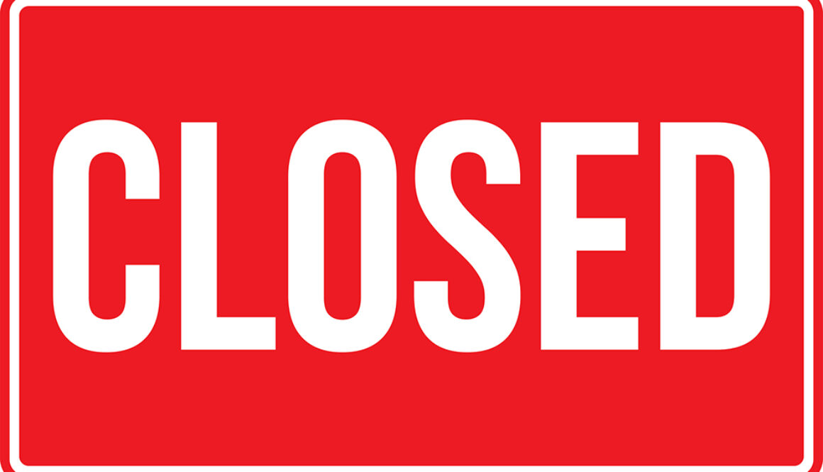 Closed Sign. White On Red Background. Business Concepts. Used As